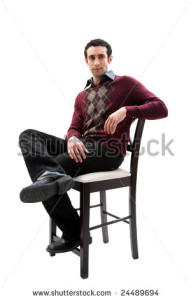 stock-photo-handsome-guy-wearing-business-casual-clothes-sitting-on-a-high-chair-with-legs-crossed-and-arm-24489694
